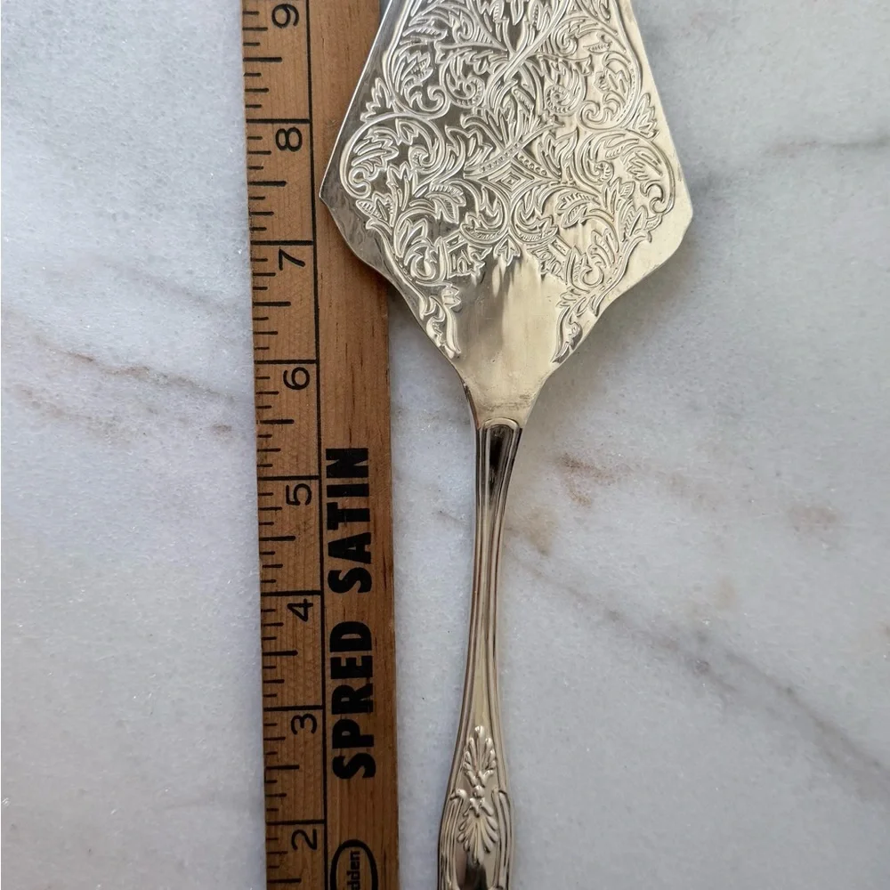 vintage silver-plated pie or cake server, frequently produced in Italy